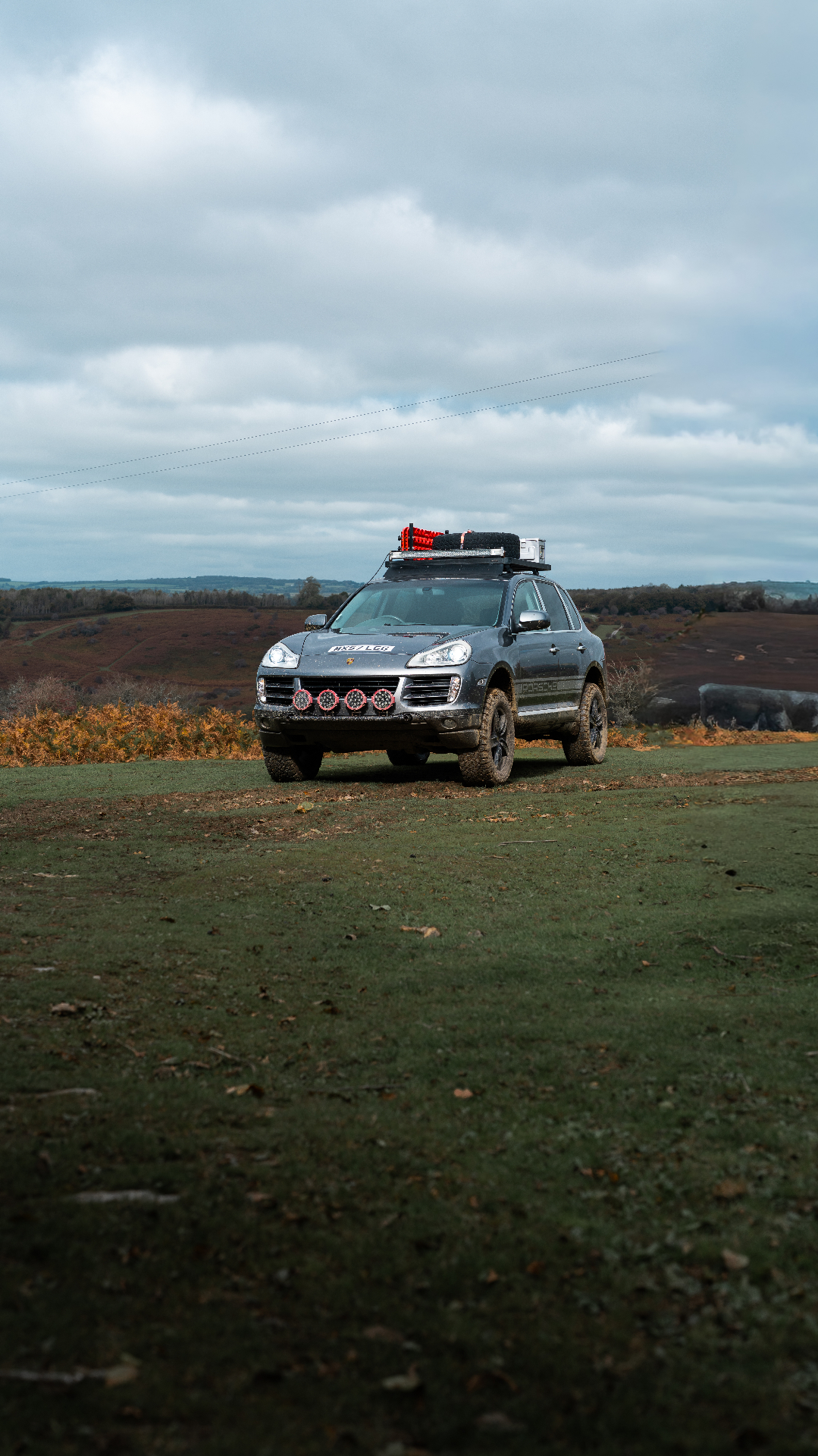 Overland-built Porsche Cayenne on open moorland